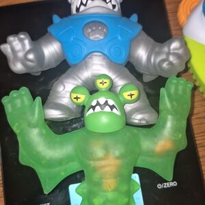 Goo Jit Zu Green and Silver Monster Action Figures